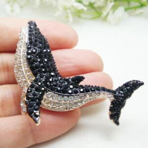 Broche dauphin noir strass