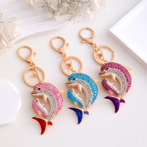 Porte-clés dauphins strass multicolores